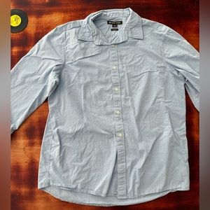 Light blue. Casual dress shirt. Michael Kors. I grew out of it.